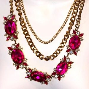 Charming Charlie’s pink/diamond rhinestone & 3 triple chain gold necklace.